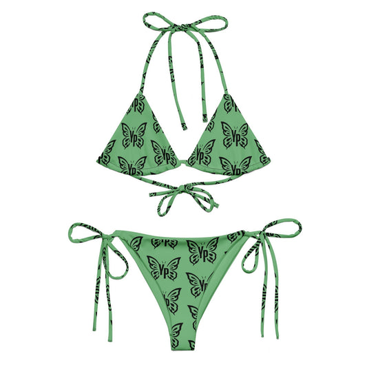 Young Player Apparel green bikini set with black butterfly print, featuring adjustable triangle top and side ties.