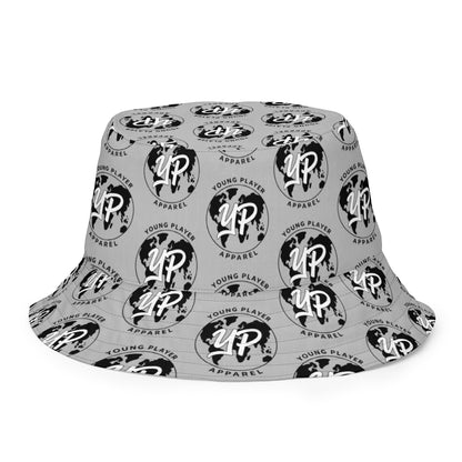 Young Player Apparel reversible bucket hat in grey with an all-over black globe logo print for streetwear style.